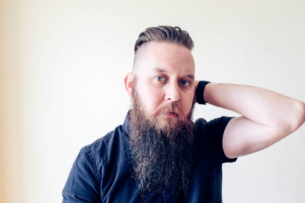 Why Your Beard Hates Your Narrow Comb (And Why a Wide-Tooth Beard Comb Is the Real MVP)
